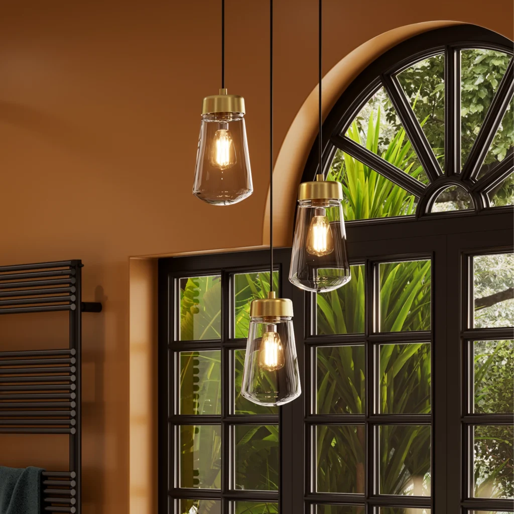 Brass and glass pendants beside an arched window